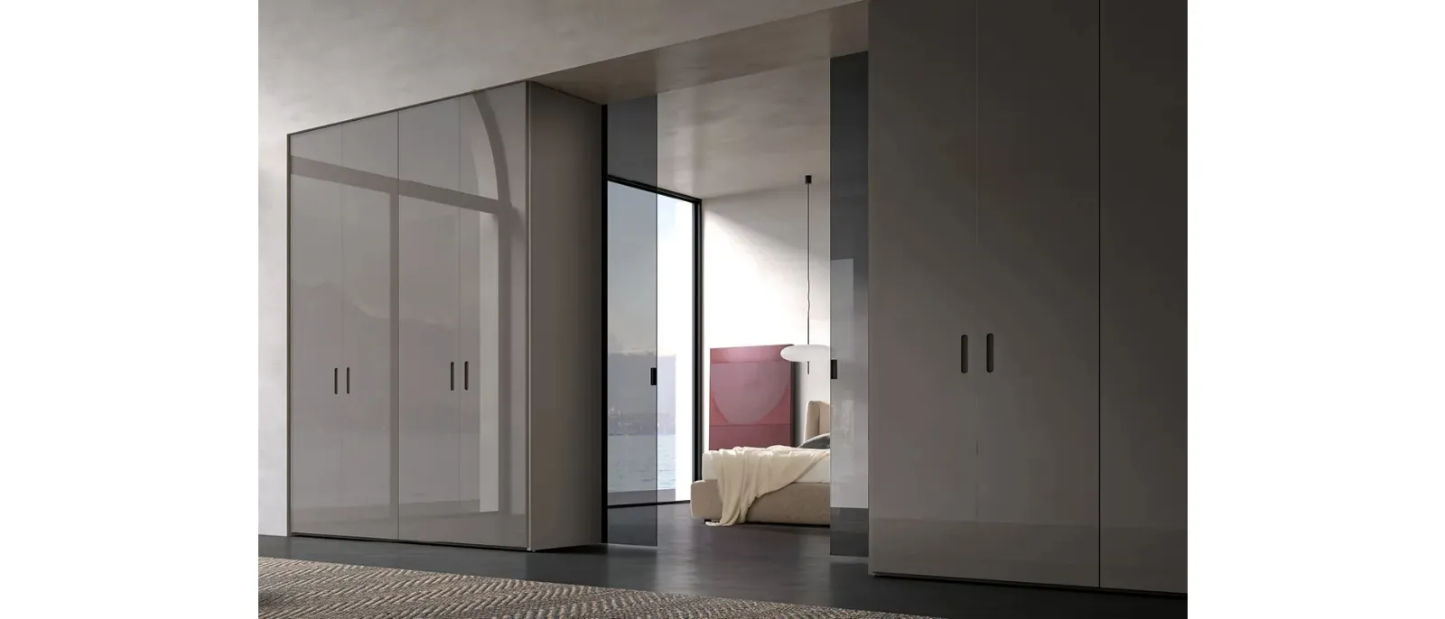 Armadio Atelier bifacciale con anta Fit realizzata in vetro laccato con finitura Fango e porta in vetro scorrevole di Adok