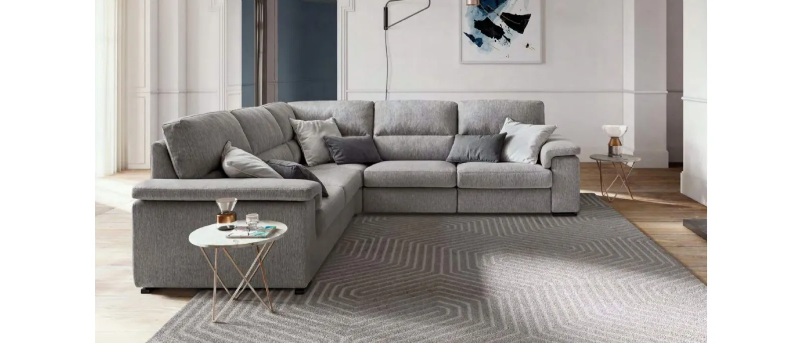Divano angolare in tessuto con movimento relax Jaro di Le Comfort